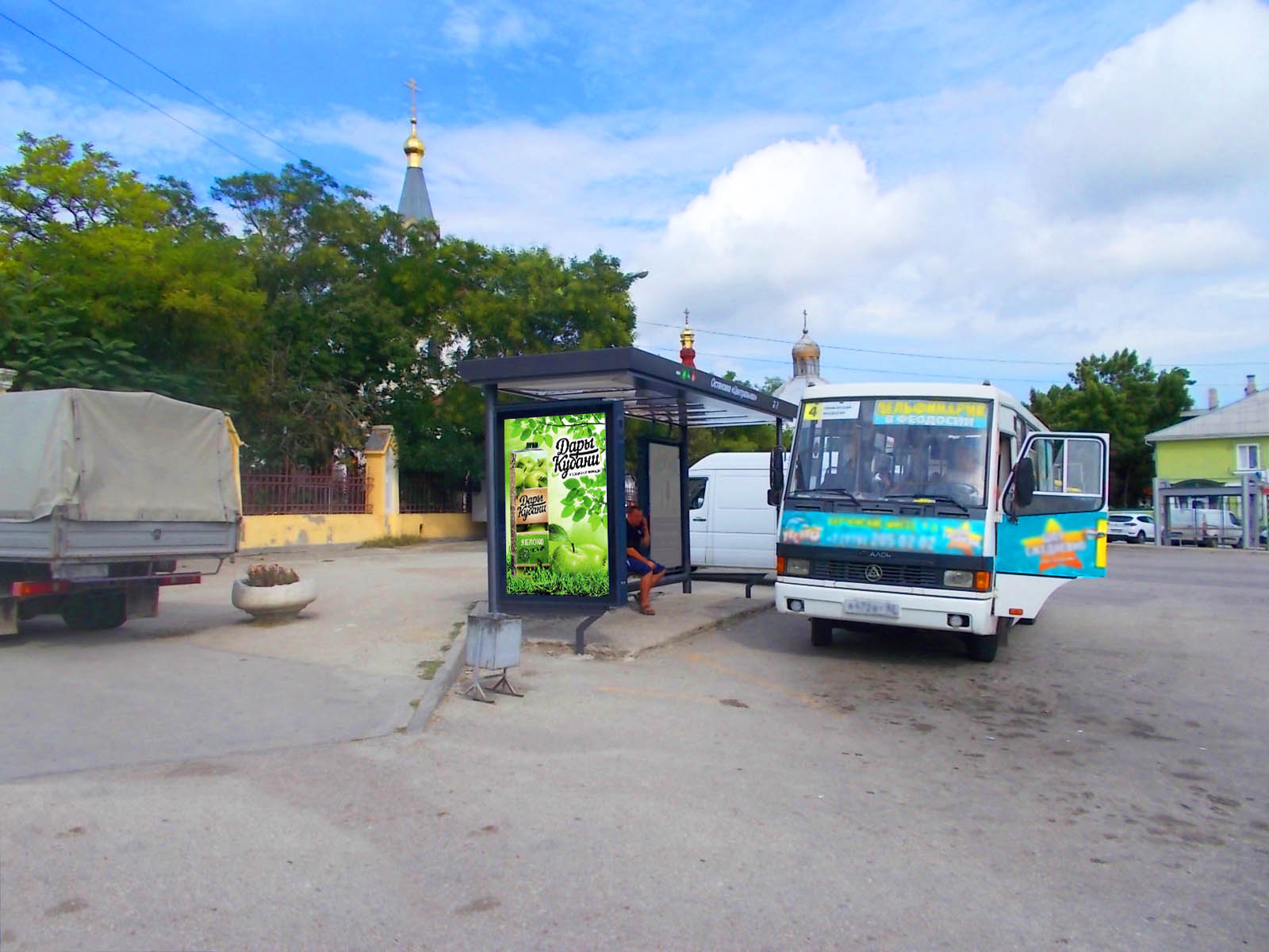 Фотография рекламного носителя, тип: Остановка 1.8x1.2, адрес: Советская ул. Х Назукина ул., ост. Центральная, поз.4, Феодосия, Республика Крым, Россия. Сторона B1 №843696