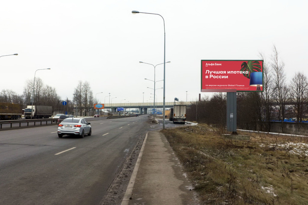 Фотография рекламного носителя, тип: Билборд 3x6, адрес: Октябрьская наб., д.31, Кудрово, Ленинградская область, Россия. Сторона A №803898