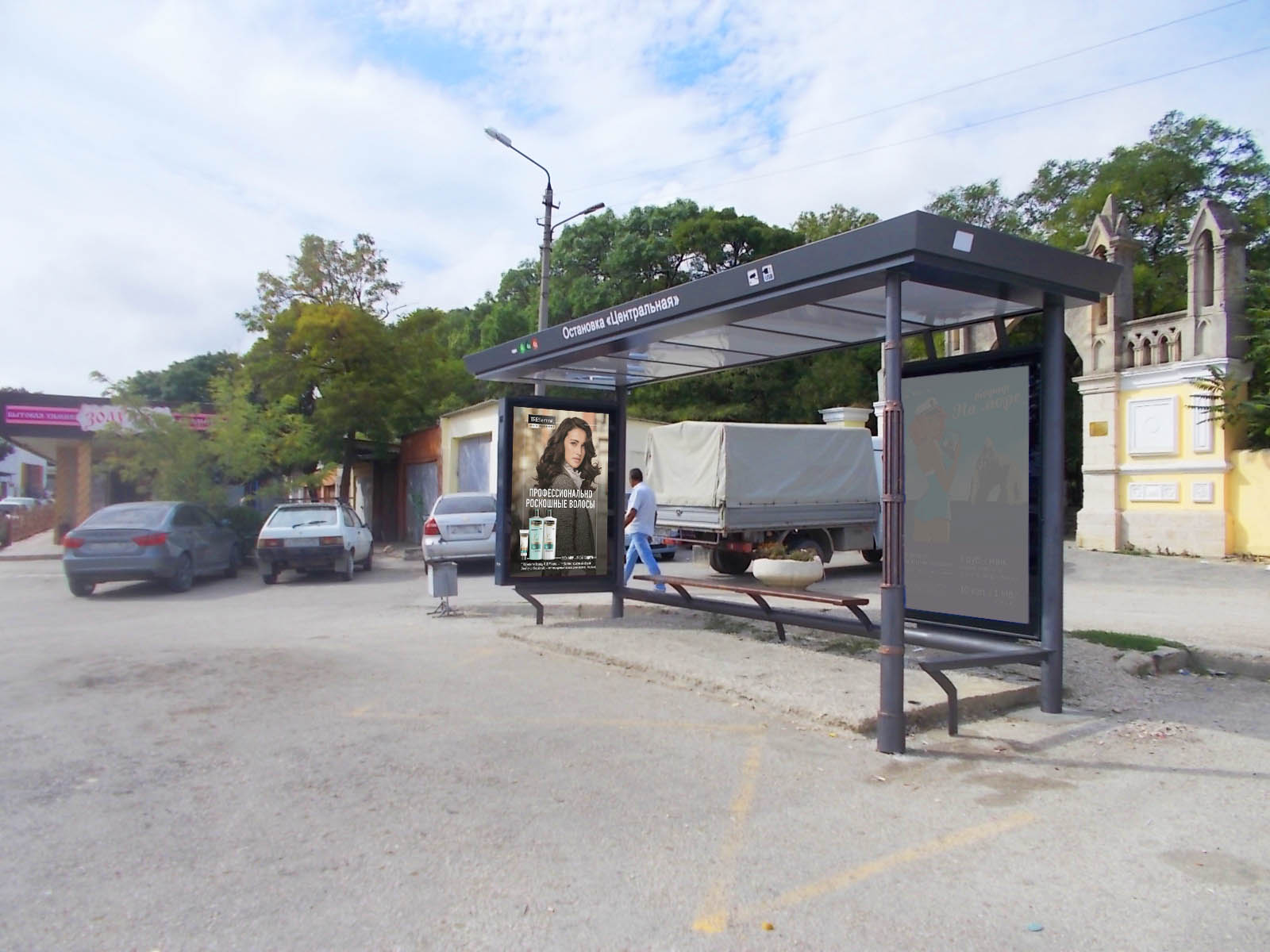 Фотография рекламного носителя, тип: Остановка 1.8x1.2, адрес: Советская ул. Х Назукина ул., ост. Центральная, поз.4, Феодосия, Республика Крым, Россия. Сторона A1 №843695