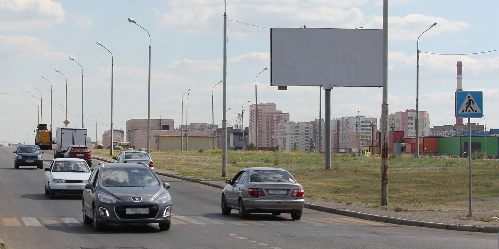 Фотография рекламного носителя, тип: Билборд 3x6, адрес: За Ледовым дворцом "Арена Металлург", поз.1, Магнитогорск, Челябинская область, Россия. Сторона А №1052316