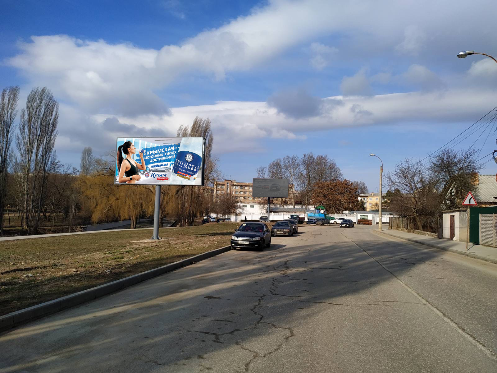 Фотография рекламного носителя, тип: Билборд 3x6, адрес: Гурзуфская ул., д.10, поз.2, Симферополь, Республика Крым, Россия. Сторона B №799566