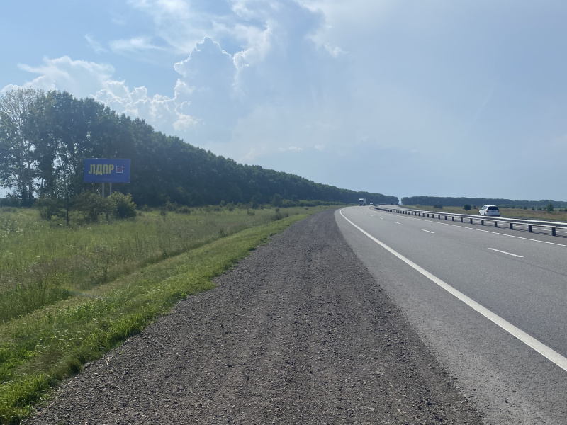 Фотография рекламного носителя, тип: Билборд 3x6, адрес: М53 а/д, 7 000м до поста ДПС, Красноярск, Красноярский край, Россия. Сторона Б №780184