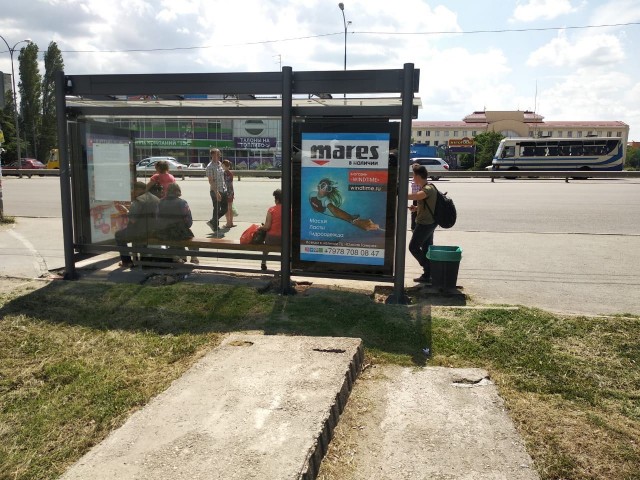 Фотография рекламного носителя, тип: Остановка 1.8x1.2, адрес: Киевская ул., ост."Республиканский военкомат", Симферополь, Республика Крым, Россия. Сторона Б2 №796497