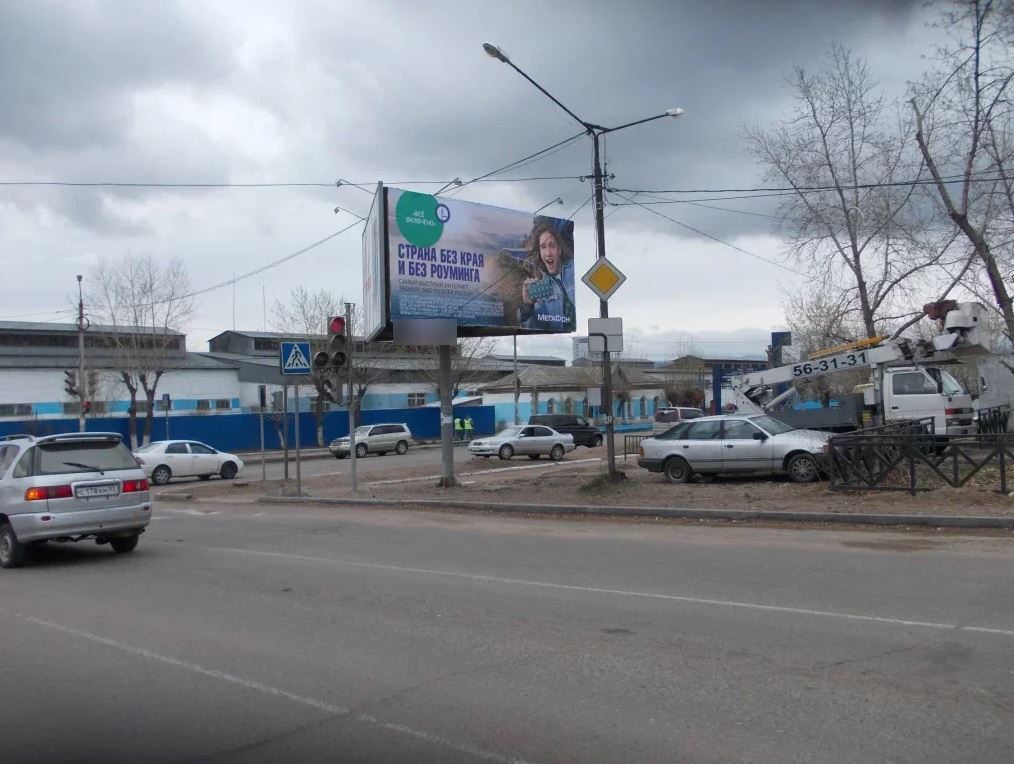Фотография рекламного носителя, тип: Билборд 3x6, адрес: Добролюбова ул. Х Революции ул., Улан-Удэ, Республика Бурятия, Россия. Сторона A №958251