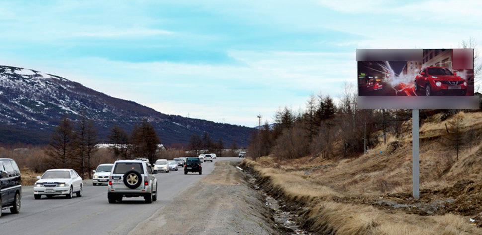 Фотография рекламного носителя, тип: Билборд 3x6, адрес: Основная трасса, 13-й км, Магадан, Магаданская область, Россия. Сторона Б №1051671