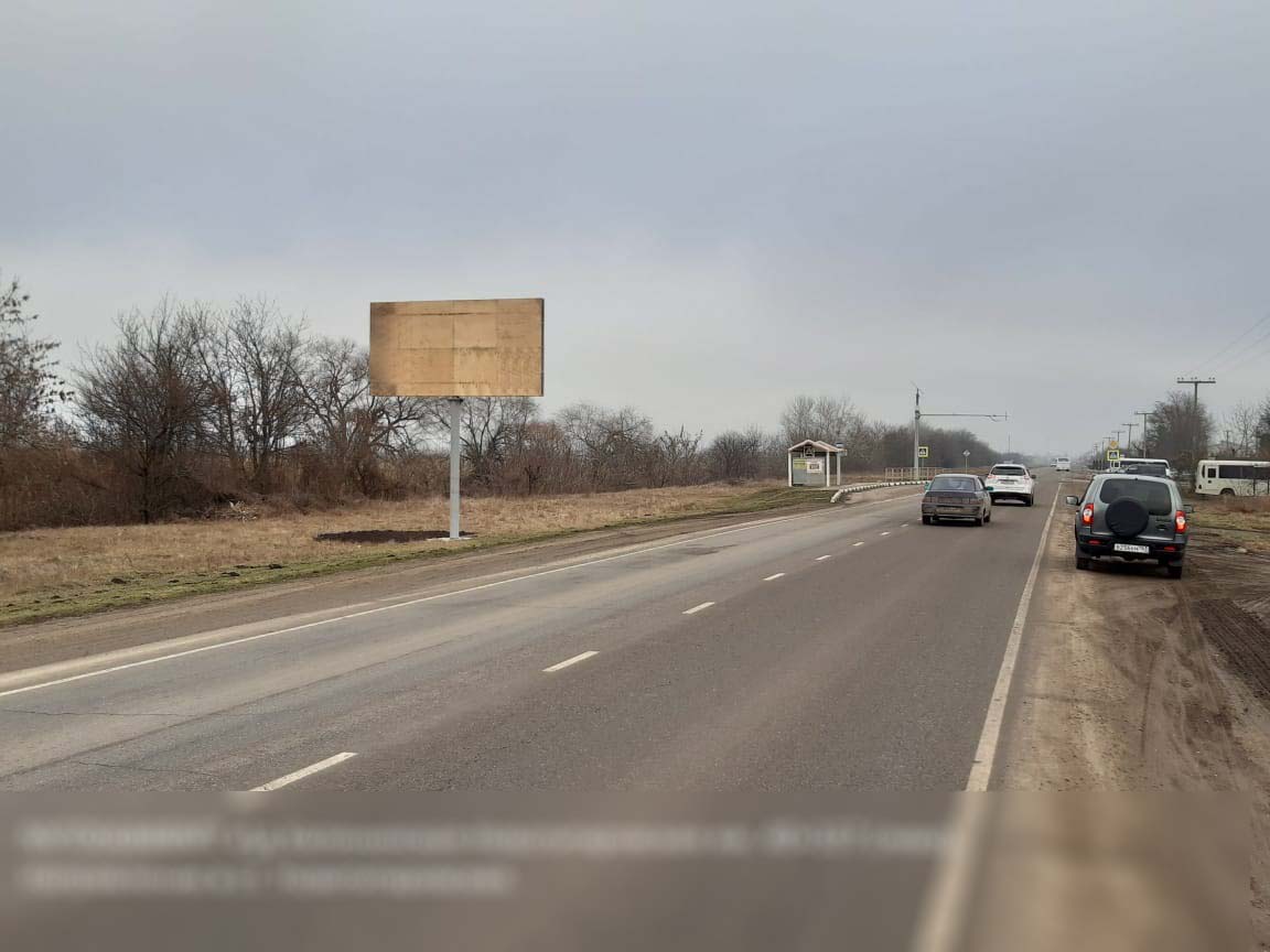 Фотография рекламного носителя, тип: Билборд 3x6, адрес: Новотитаровская станица, Калининская-Новотитаровская а/д, 40 107м, Краснодарский край, Россия. Сторона B №840631