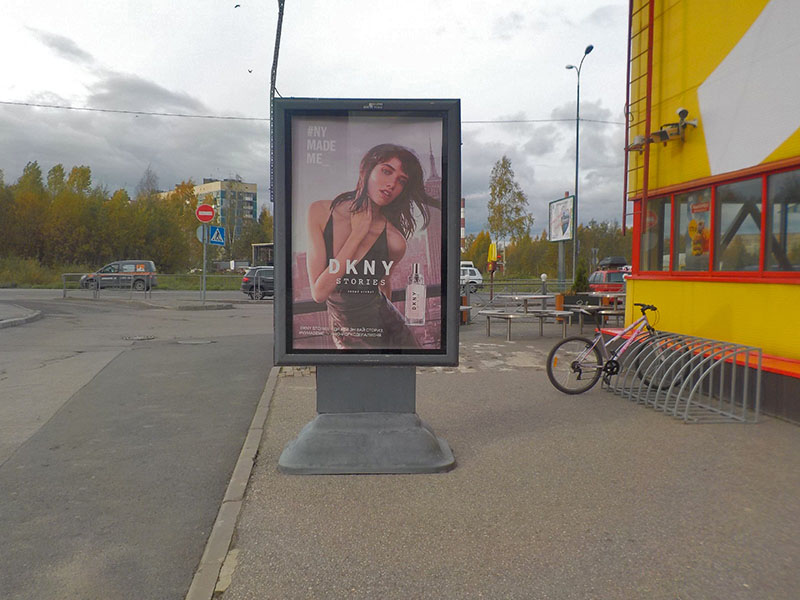 Фотография рекламного носителя, тип: Ситиформат 1.8x1.2, адрес: Новое Девяткино д., д.101, поз.2, Ленинградская область, Россия. Сторона B №484682