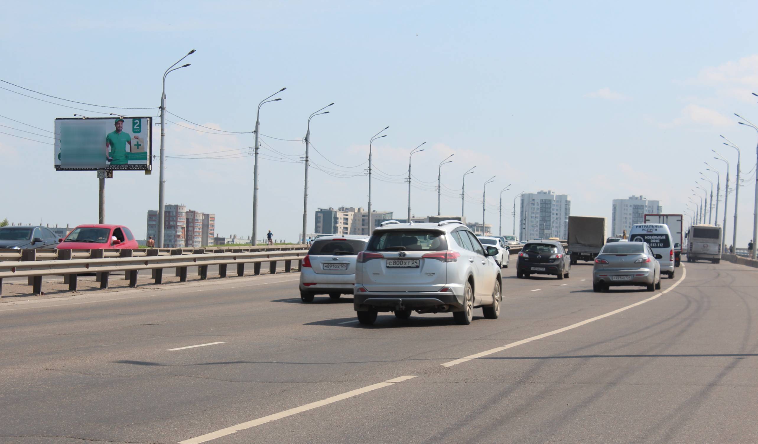 Фотография рекламного носителя, тип: Билборд 3x6, адрес: Октябрьский мост, 50м, Красноярск, Красноярский край, Россия. Сторона Б №819889