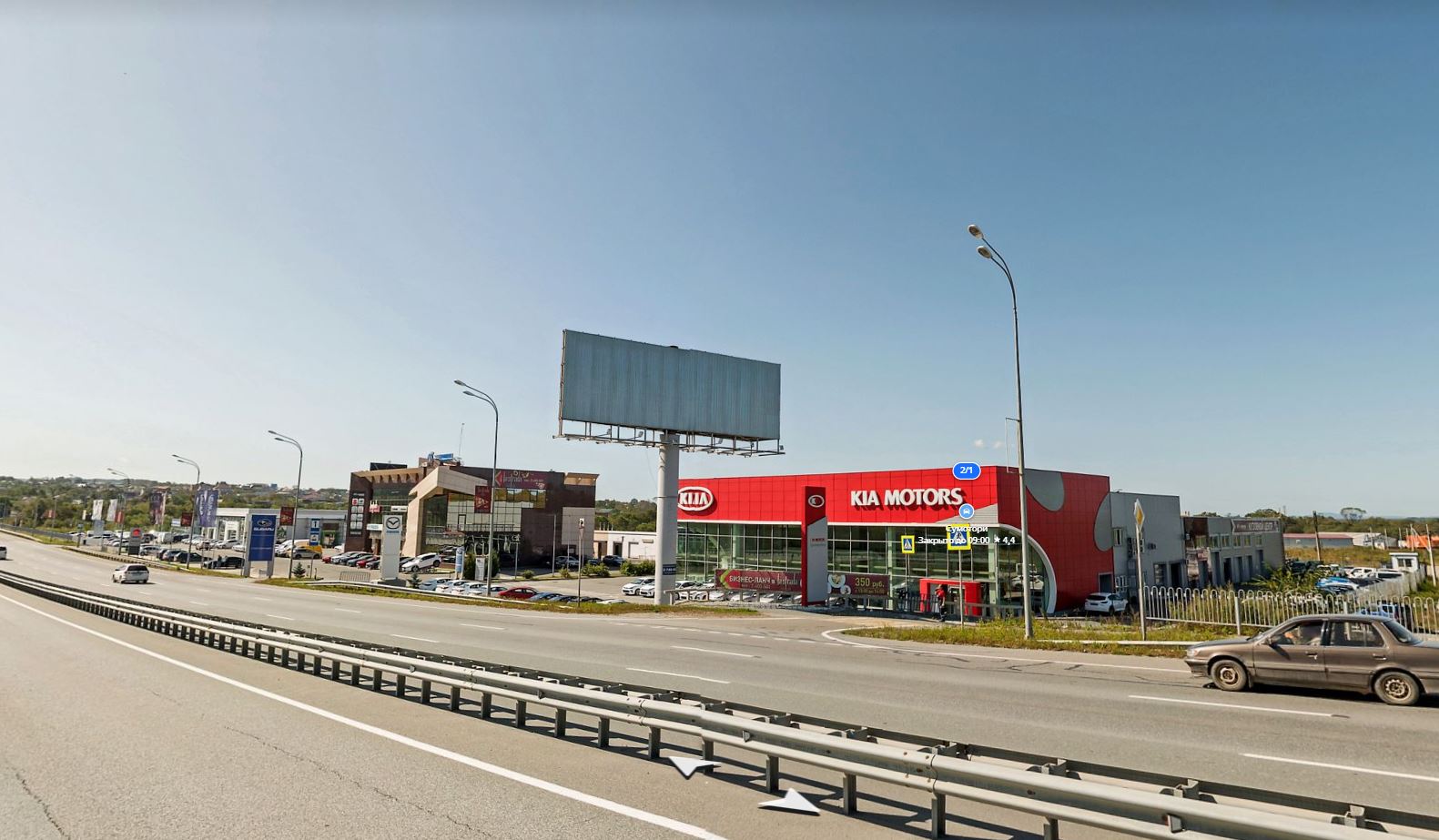 Фотография рекламного носителя, тип: Суперсайт 5x15, адрес: Артем г., 735 150м, Мерседес-центр, поз.1, Владивосток, Приморский край, Россия. Сторона A №994117