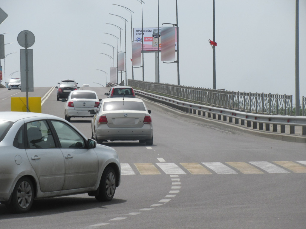 Фотография рекламного носителя, тип: Билборд 3x6, адрес: Авиаторов ш., заезд на путепровод в аэропорт, Волгоград, Волгоградская область, Россия. Сторона A №1000503
