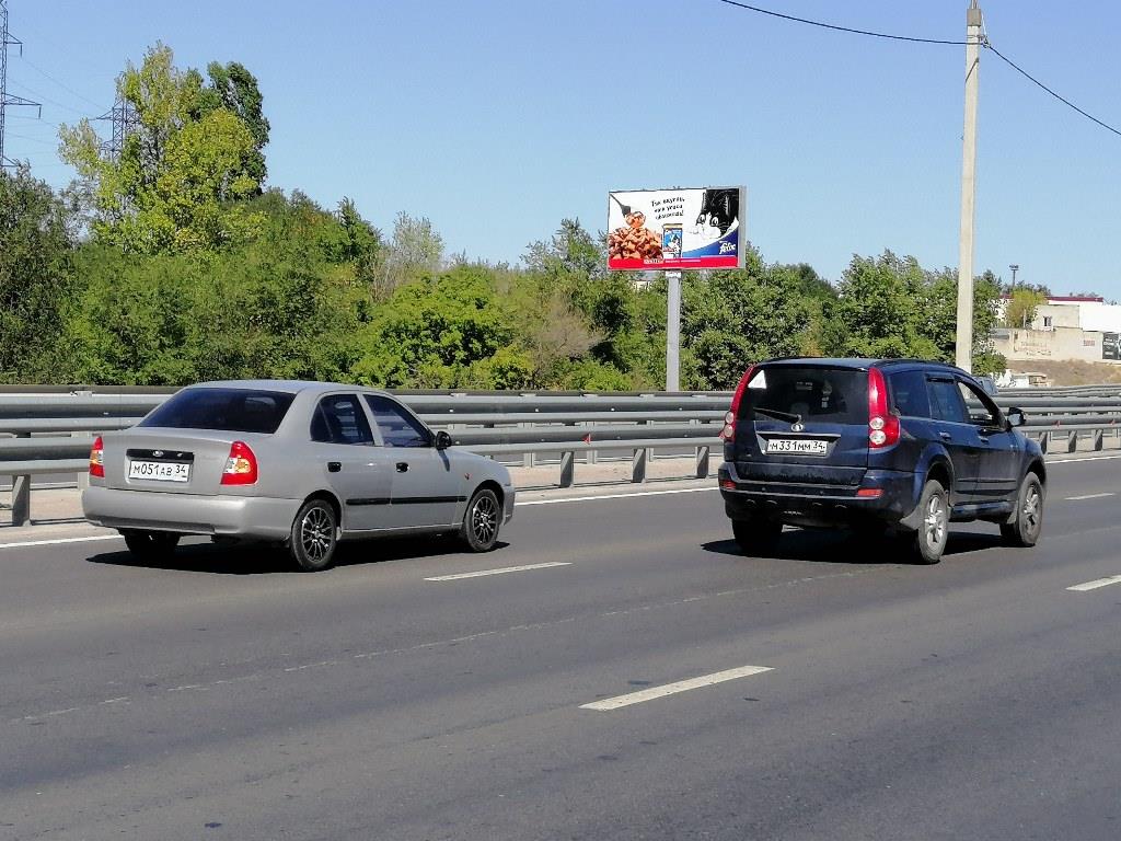 Фотография рекламного носителя, тип: Билборд 3x6, адрес: 3-я продольная ул. Х Маршала Жукова пр-т., поз.1, Волгоград, Волгоградская область, Россия. Сторона Б №516812