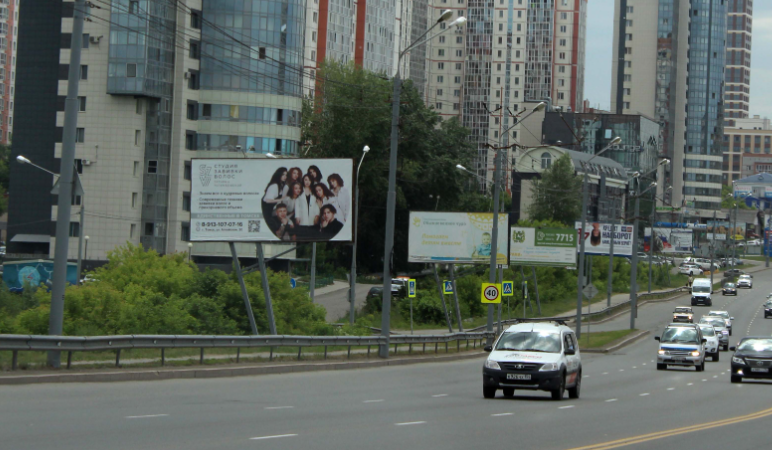 Фотография рекламного носителя, тип: Билборд 3x6, адрес: Комсомольский пр-т., мост, поз. 2, Томск, Томская область, Россия. Сторона В №296788