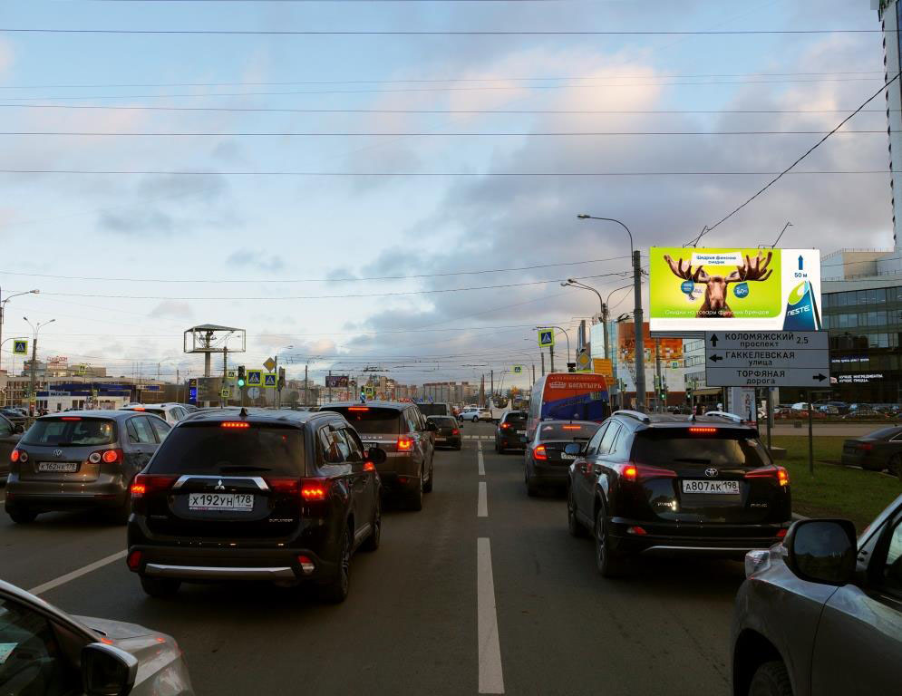 Фотография рекламного носителя, тип: Билборд 3x6, адрес: Богатырский пр-т., д.22, корп.1, Санкт-Петербург, Россия. Сторона Аh1-Аh4 №1046649
