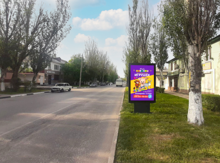 Фотография рекламного носителя, тип: Ситиформат 1.8x1.2, адрес: Советская ул. 4 / Назукина ул., район АВТОВОКЗАЛА, остановка Центральная, Феодосия, Республика Крым, Россия. Сторона А №1081132