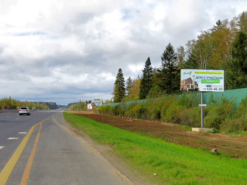 Фотография рекламного носителя, тип: Билборд 3x6, адрес: Новорижское ш., 59 900м, Московская область, Россия. Сторона А №443845