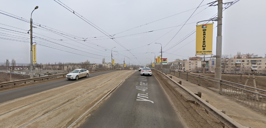 Фотография рекламного носителя, тип: Панель-кронштейн, адрес: 40 Лет ВЛКСМ ул., Мост ВЛКСМ, Волгоград, Волгоградская область, Россия. Сторона А №1097337