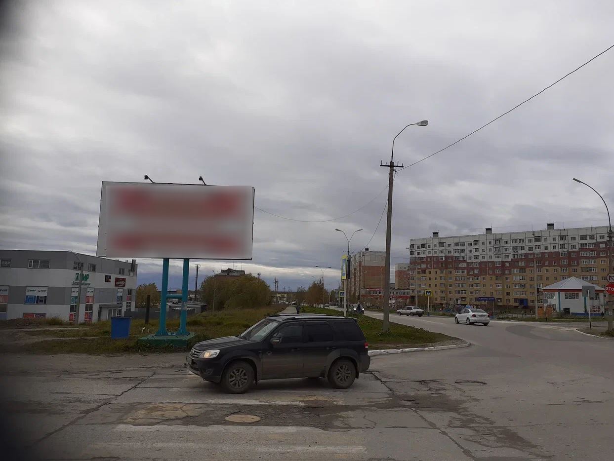 Фотография рекламного носителя, тип: Билборд 3x6, адрес: 60 лет Октября ул., д.2а, Усинск, Республика Коми, Россия. Сторона Б №982242