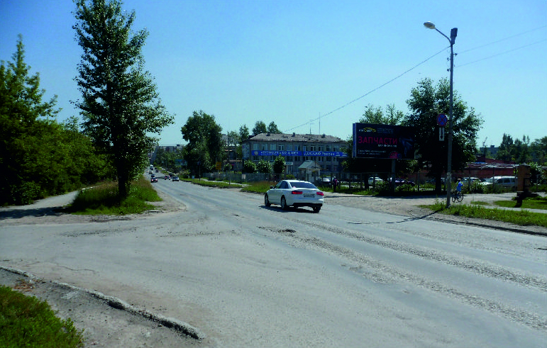 Фотография рекламного носителя, тип: Билборд 3x6, адрес: Ладыженского ул., д.11, Асбест, Свердловская область, Россия. Сторона A №1084867