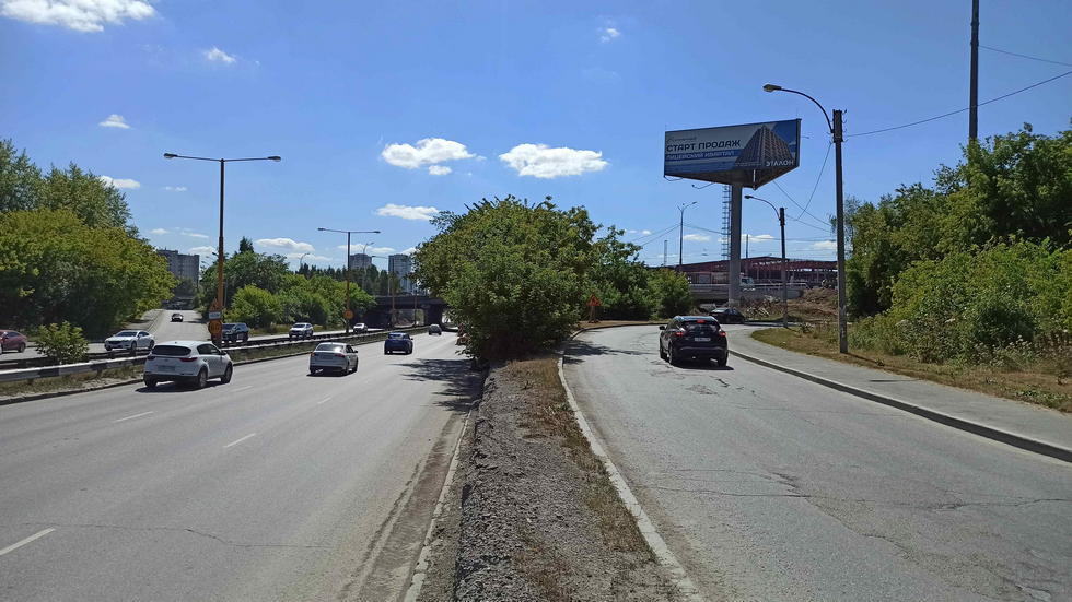 Фотография рекламного носителя, тип: Суперсайт 5x15, адрес: Объездная а/д Х Белинского ул., д.183, Екатеринбург, Свердловская область, Россия. Сторона А2 №943867