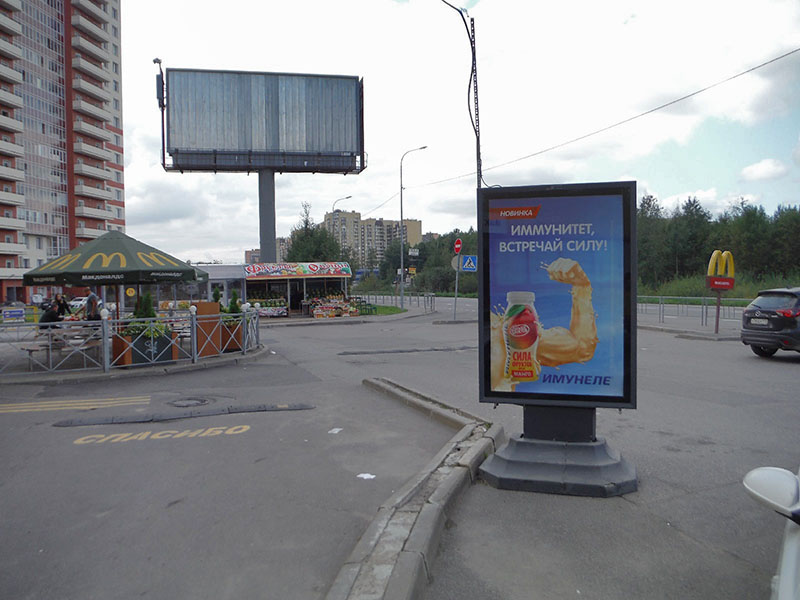 Фотография рекламного носителя, тип: Ситиформат 1.8x1.2, адрес: Новое Девяткино д., д.101, поз.1, Ленинградская область, Россия. Сторона B №484680
