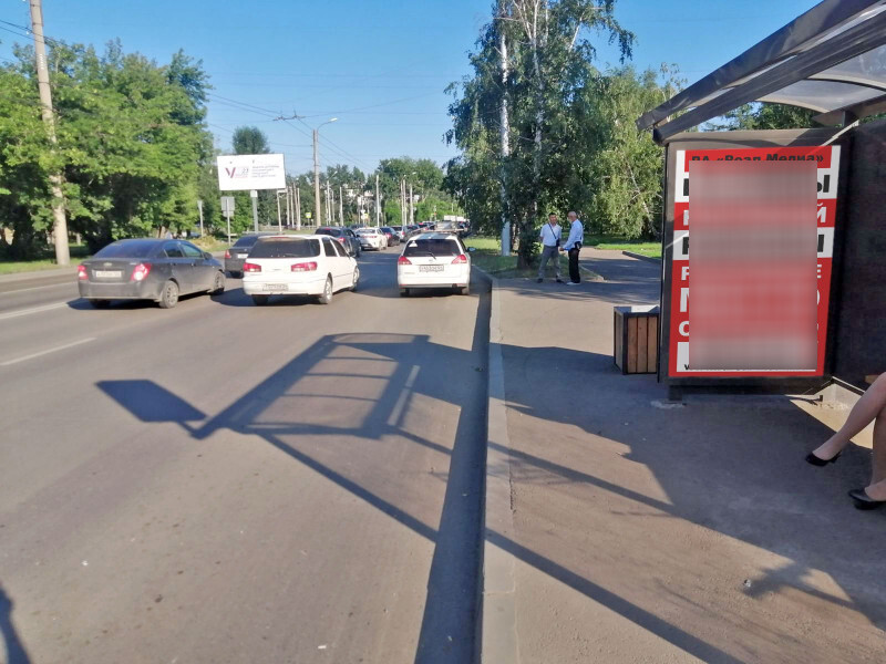 Фотография рекламного носителя, тип: Остановка 1.8x1.2, адрес: Воронова ул., д.10а, ост. "СПТУ-18", поз.1, Красноярск, Красноярский край, Россия. Сторона А №1046527