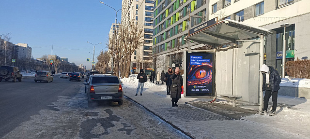 Фотография рекламного носителя, тип: Остановка 1.8x1.2, адрес: 50 лет Октября ул. Х Севастопольская ул., Новин квартал, Тюмень, Тюменская область, Россия. Сторона А №748387