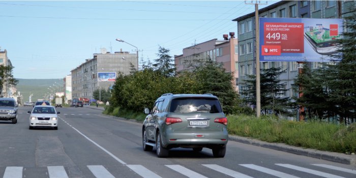 Фотография рекламного носителя, тип: Билборд 3x6, адрес: Космонавтов пл., д.7, Магадан, Магаданская область, Россия. Сторона A №1060485
