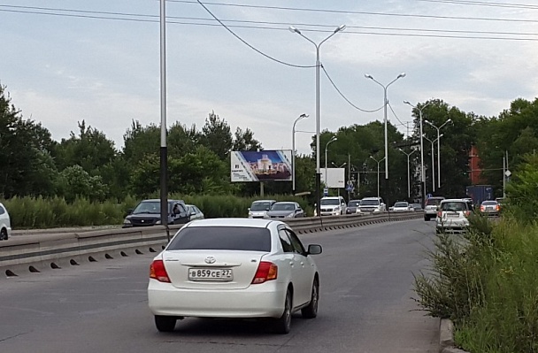 Фотография рекламного носителя, тип: Билборд 3x6, адрес: Магистральная ул. Х Юности ул., поворот на базу, Хабаровск, Хабаровский край, Россия. Сторона В №797192