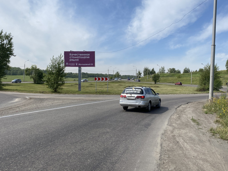 Фотография рекламного носителя, тип: Билборд 3x6, адрес: Енисейский тр-т., д.51, на кольце транспортной развязки, Красноярск, Красноярский край, Россия. Сторона A №1046593