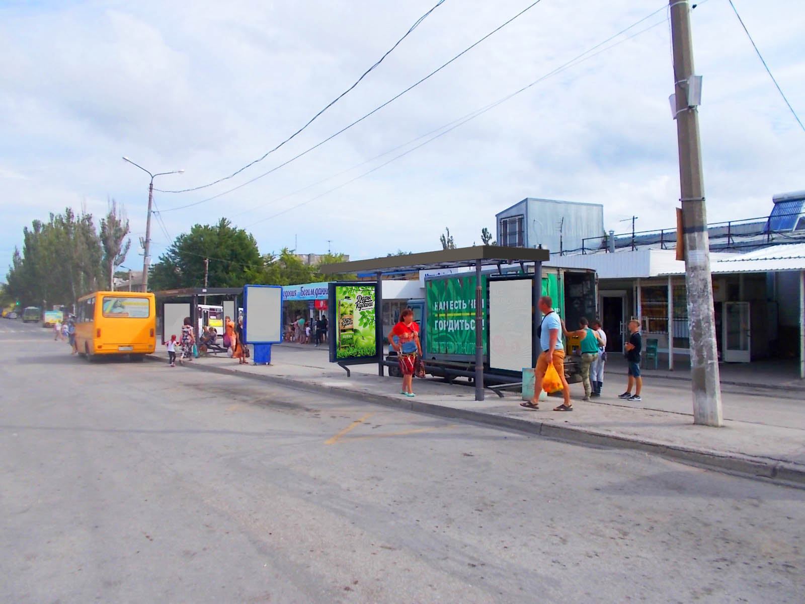 Фотография рекламного носителя, тип: Остановка 1.8x1.2, адрес: Советская ул. Х Назукина ул., ост. Центральная, поз.2, Феодосия, Республика Крым, Россия. Сторона A1 №843687