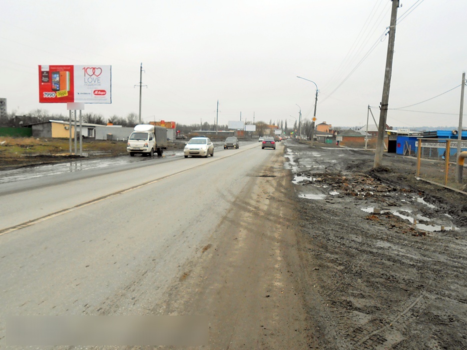 Фотография рекламного носителя, тип: Билборд 3x6, адрес: Харьковская ул., д.65, Новочеркасск, Ростовская область, Россия. Сторона B №500370