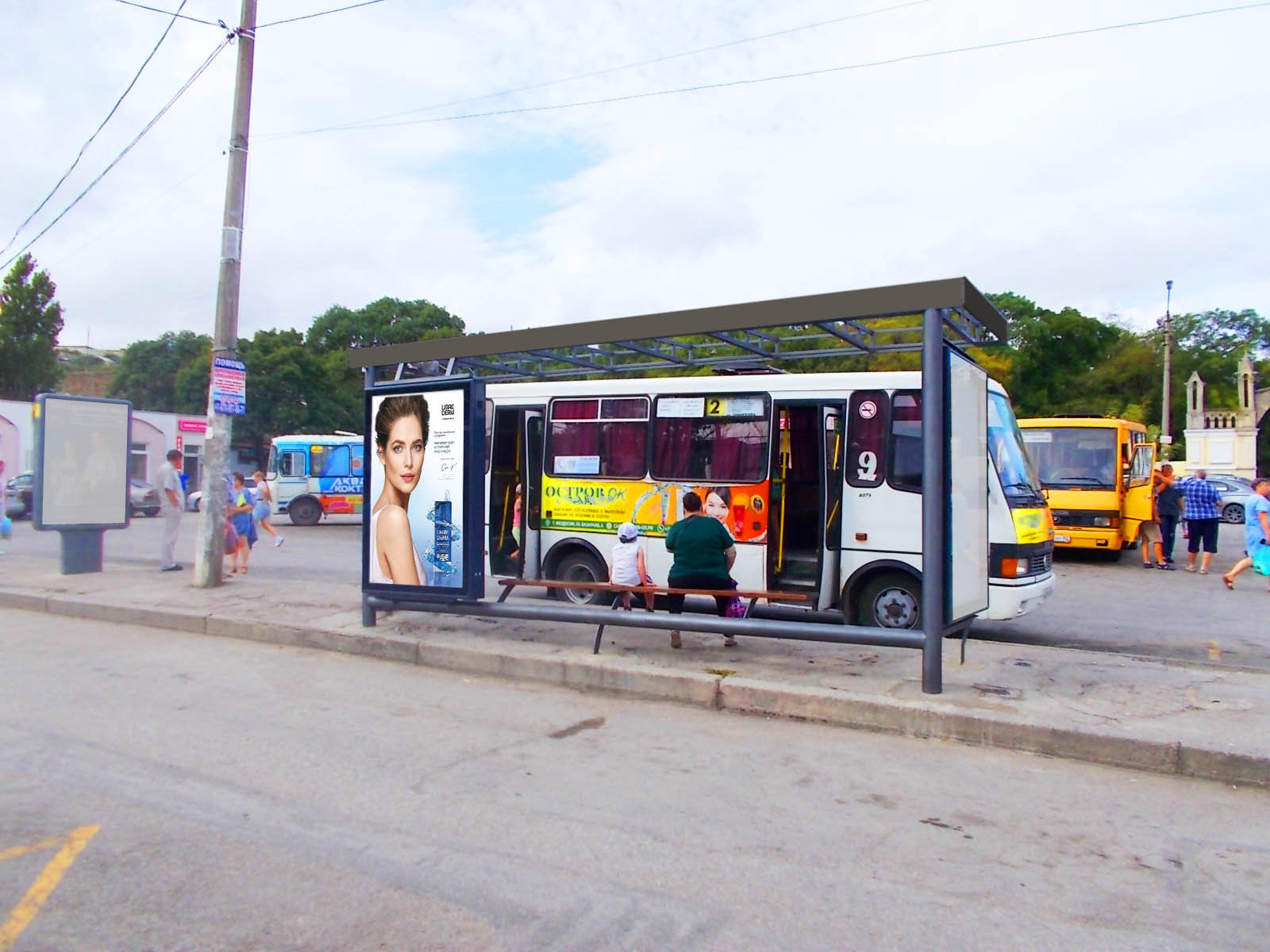 Фотография рекламного носителя, тип: Остановка 1.8x1.2, адрес: Советская ул. Х Назукина ул., ост. Центральная, поз.2, Феодосия, Республика Крым, Россия. Сторона B2 №843690