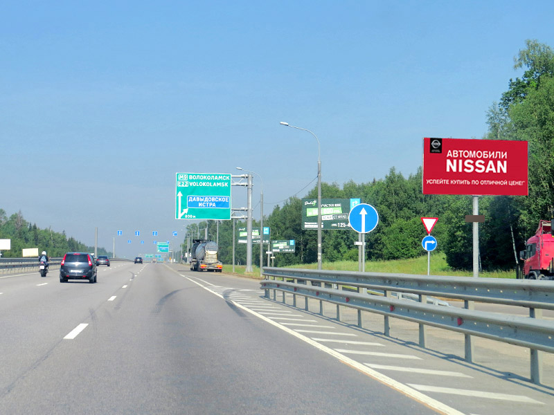 Фотография рекламного носителя, тип: Билборд 3x6, адрес: Новорижское ш., 56 600м, Московская область, Россия. Сторона А №443849