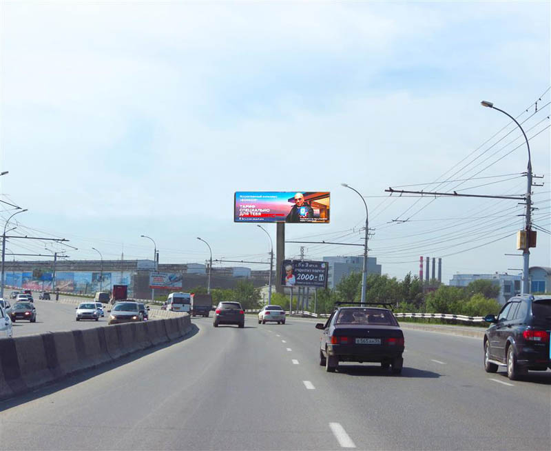 Фотография рекламного носителя, тип: Суперсайт 5x15, адрес: Димитровский мост, 500м до ТЦ Сибирский Гигант, Новосибирск, Новосибирская область, Россия. Сторона Аh1-Аh4 №992722