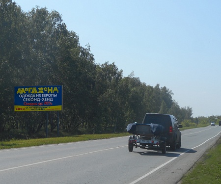 Фотография рекламного носителя, тип: Билборд 3x6, адрес: Омск-Красноярка а/д, 31 782м, Омск, Омская область, Россия. Сторона В №769321