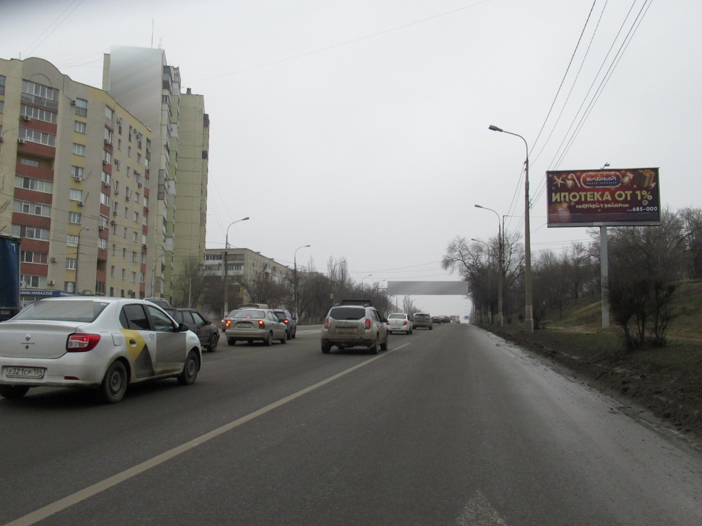 Фотография рекламного носителя, тип: Билборд 3x6, адрес: Университетский пр-т., напротив поворота на Сухова ул., Волгоград, Волгоградская область, Россия. Сторона A №1047407