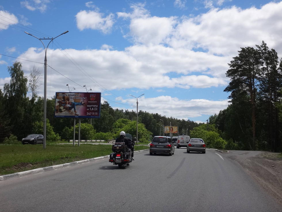 Фотография рекламного носителя, тип: Билборд 3x6, адрес: Бердское ш. Х Университетский пр-т., Новосибирск, Новосибирская область, Россия. Сторона А2 №615145