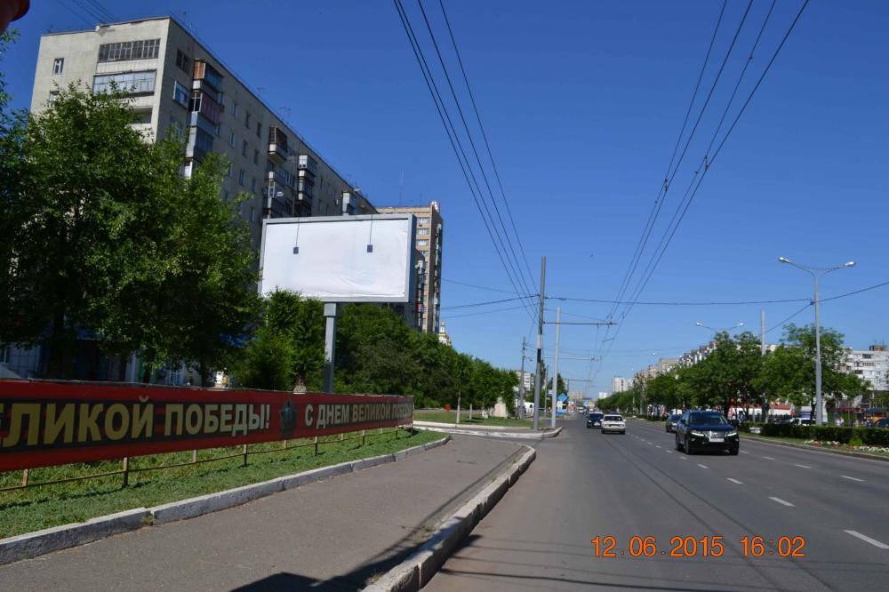 Фотография рекламного носителя, тип: Билборд 3x6, адрес: Чкалова ул., д.2, поз.1, Оренбург, Оренбургская область, Россия. Сторона B №647638