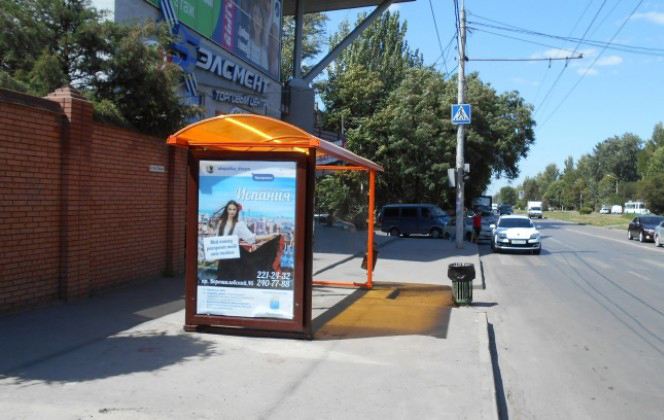 Фотография рекламного носителя, тип: Остановка 1.8x1.2, адрес: 40-летия Победы пр-т., ост. ПролетР "пер.Молочный", поз.2, Ростов-на-Дону, Ростовская область, Россия. Сторона Б №622060
