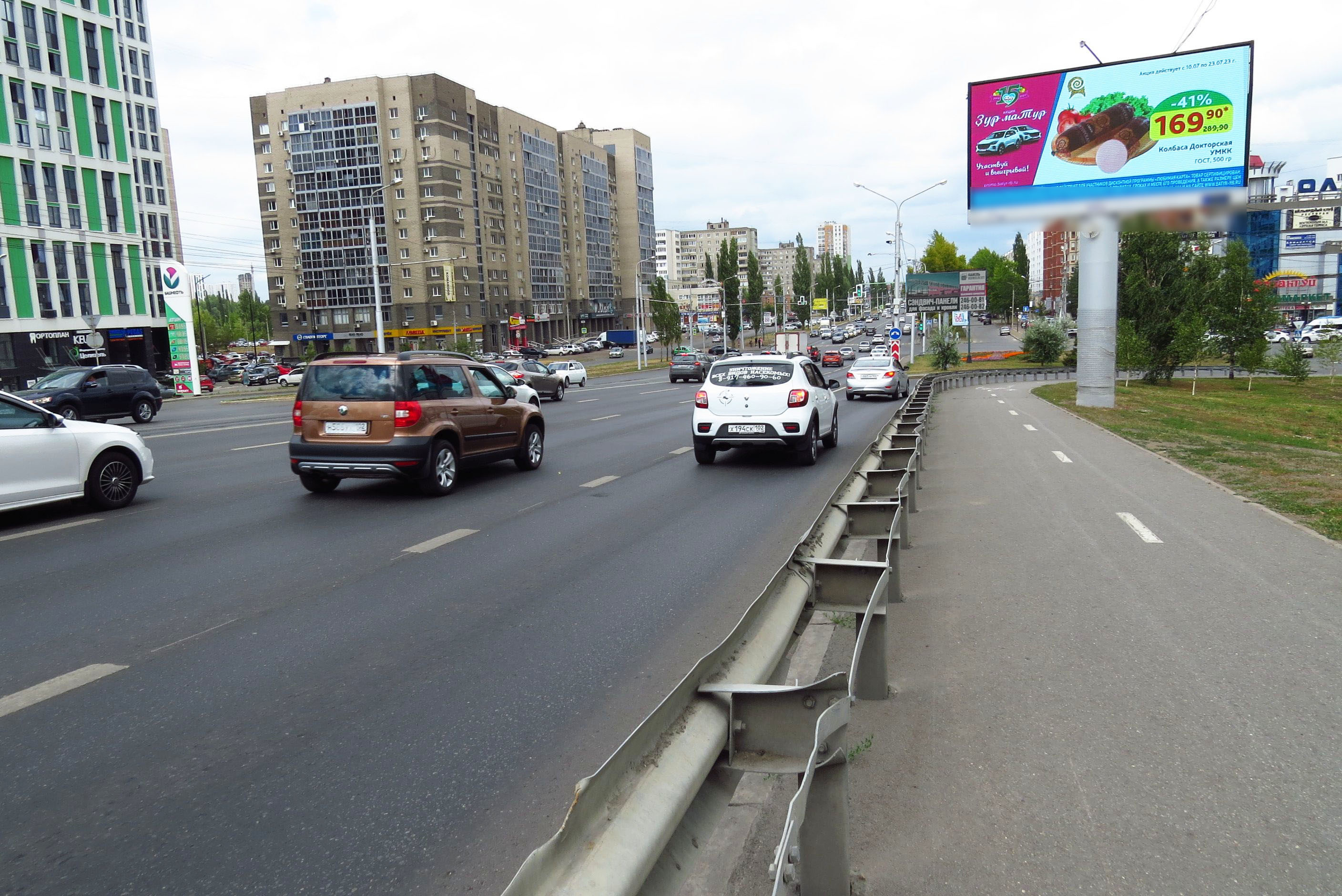 Фотография рекламного носителя, тип: Билборд 3x6, адрес: Маршала Жукова ул., д.2/1, Уфа, Республика Башкортостан, Россия. Сторона Аh1-Аh4 №938490