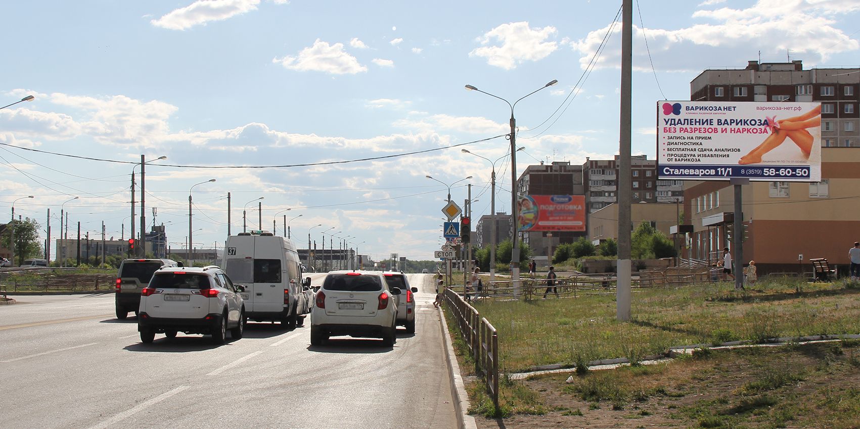 Фотография рекламного носителя, тип: Билборд 3x6, адрес: Жукова ул., д.23 Х Зеленый Лог пер., Магнитогорск, Челябинская область, Россия. Сторона А №1052279