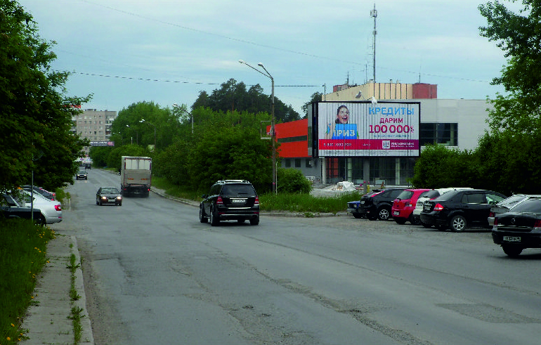 Фотография рекламного носителя, тип: Билборд 3x6, адрес: Ленинградская ул., д.24, Асбест, Свердловская область, Россия. Сторона A1-А3 №1084899