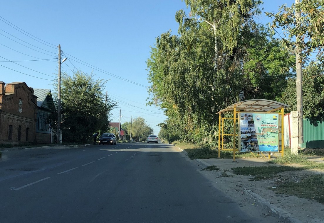 Фотография рекламного носителя, тип: Остановка 1.4x1.6, адрес: Володарского ул., д.100, ост. Рынок, Вольск, Саратовская область, Россия. Сторона A №1078465