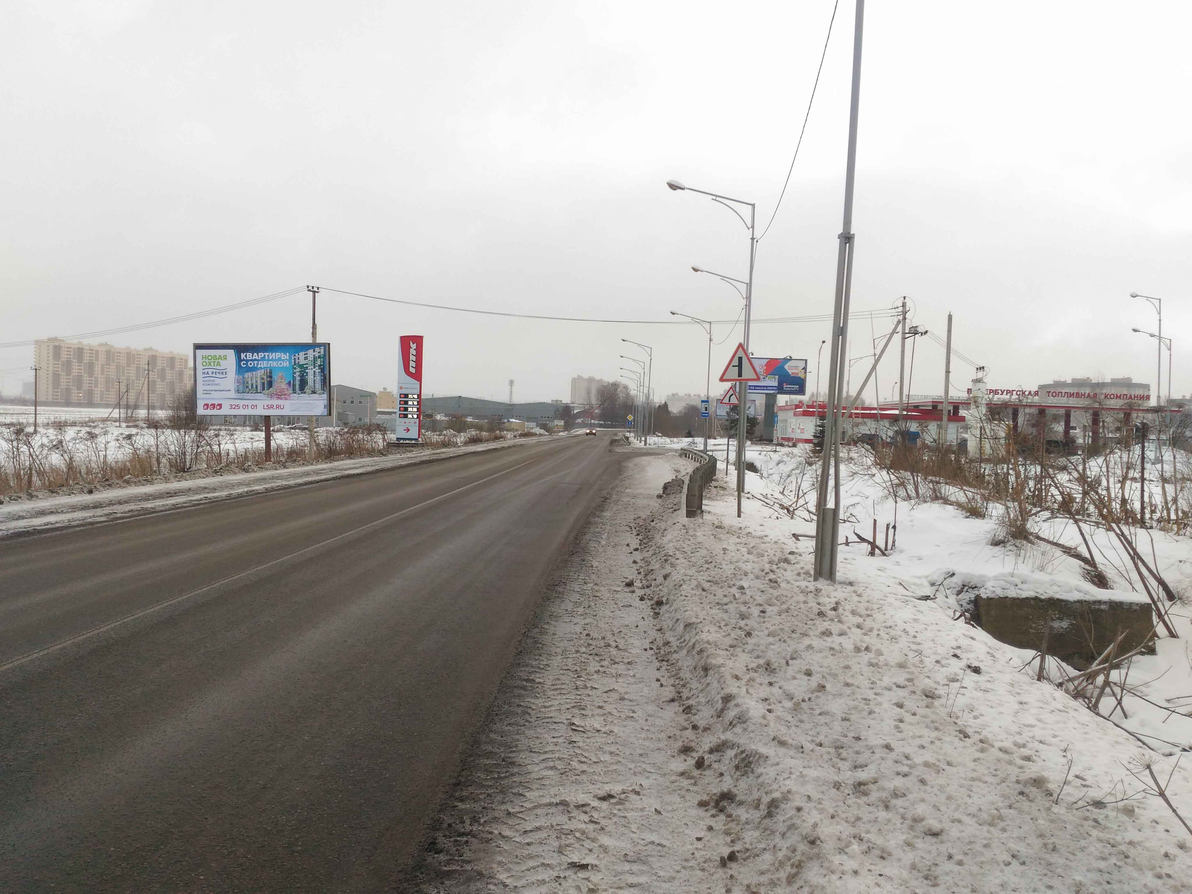 Фотография рекламного носителя, тип: Билборд 3x6, адрес: Бугры пос., Шоссейная ул., у заправки Роснефть, Санкт-Петербург, Россия. Сторона Б №680957