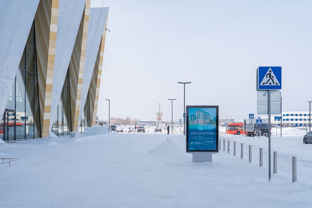 Фотография рекламного носителя, тип: Ситиформат 1.8x1.2, адрес: Привокзальная пл., поз.1, Новый Уренгой, Ямало-Ненецкий автономный округ, Россия. Сторона Б №1094490