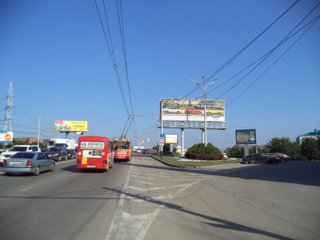 Фотография рекламного носителя, тип: Суперсайт 4x12, адрес: Ялтинская ул. Х Новгородская ул., Краснодар, Краснодарский край, Россия. Сторона А1-А3 №409630