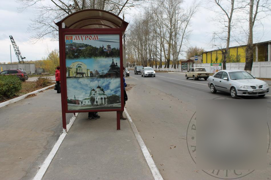 Фотография рекламного носителя, тип: Остановка 1.8x1.2, адрес: Владимирское ш., м-н «Спутник», Муром, Владимирская область, Россия. Сторона Б №614860