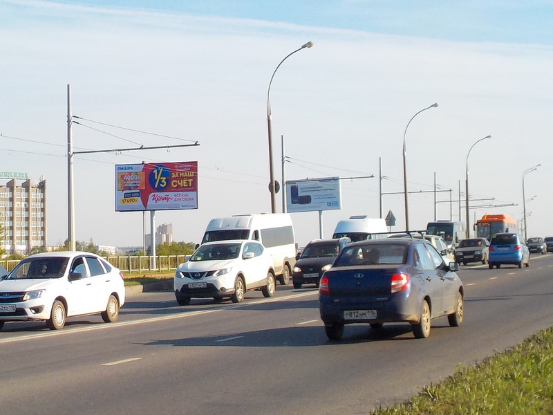 Фотография рекламного носителя, тип: Билборд 3x6, адрес: Набережночелнинский пр-т., мост через р.Челнинка, поз.1, Набережные Челны, Республика Татарстан, Россия. Сторона B №414076