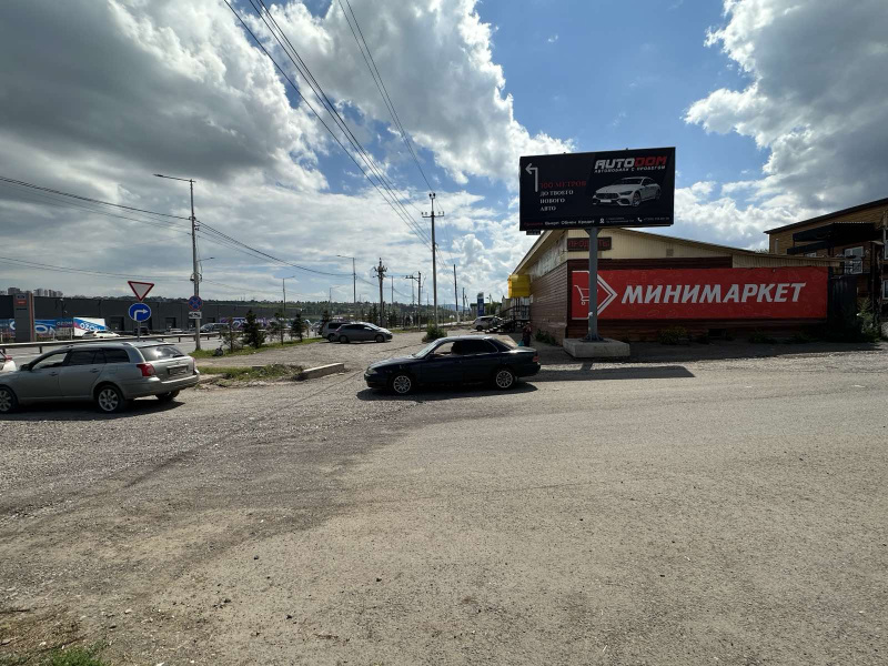 Фотография рекламного носителя, тип: Билборд 3x6, адрес: Котельникова пр-т., д.16а, Красноярск, Красноярский край, Россия. Сторона А №1097909