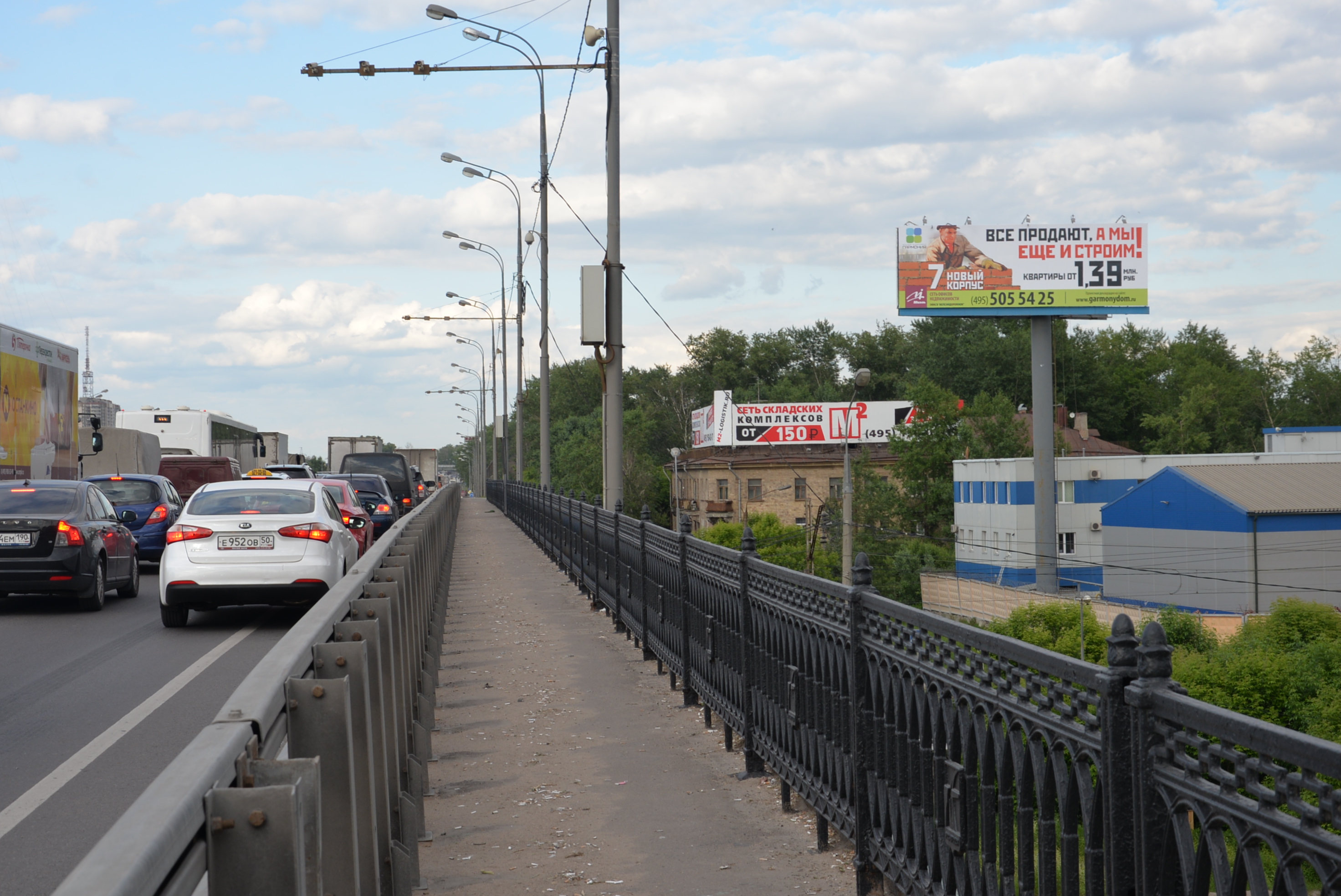 Фотография рекламного носителя, тип: Суперсайт 5x15, адрес: Горьковский мост, 800м от МКАД, Реутов, Московская область, Россия. Сторона А №527893